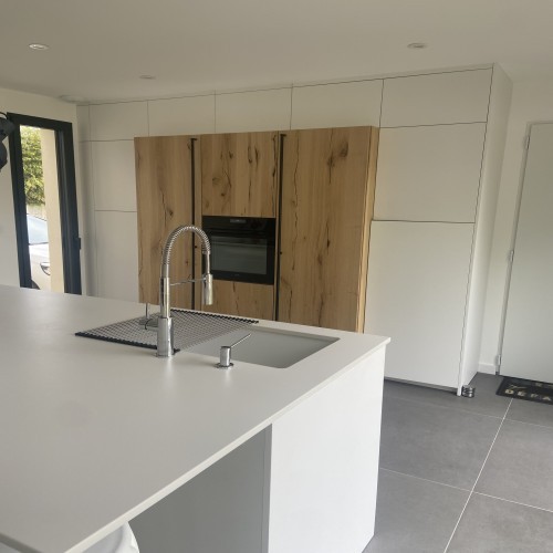 Photo de notre réalisation Une maison neuve avec sa cuisine ouverte 